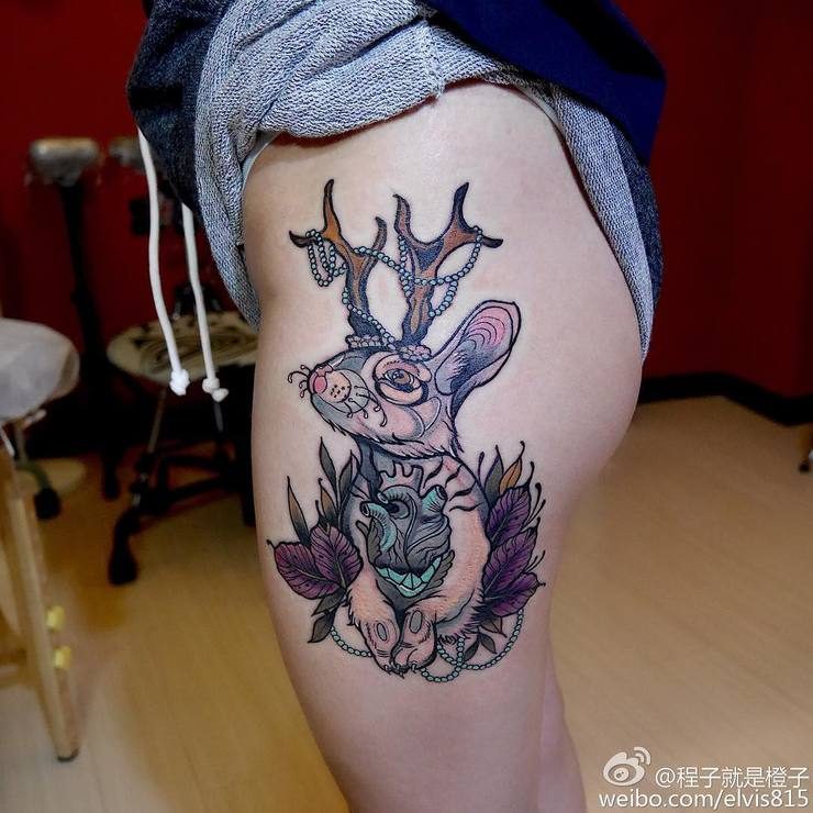 Colorful rabbit tatto with horns and plants