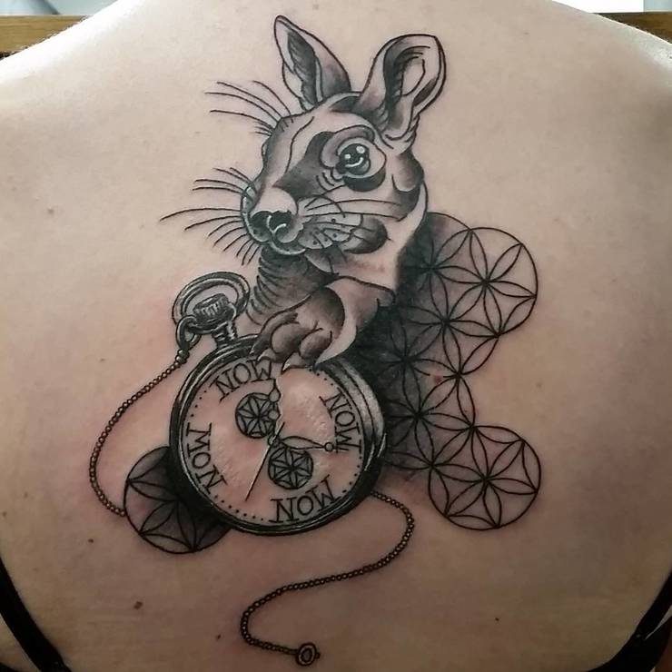 Rabbit tattoo with clock