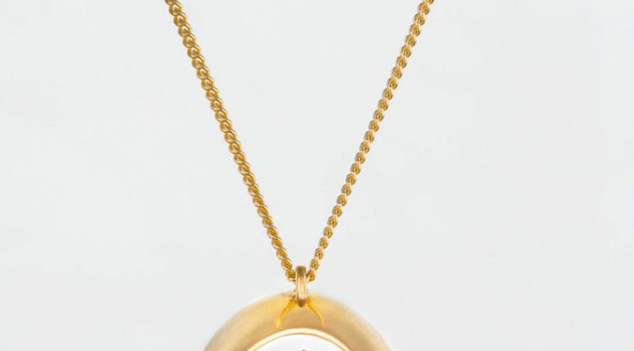 Miniature worlds encapsulated in gold and silver pendants
