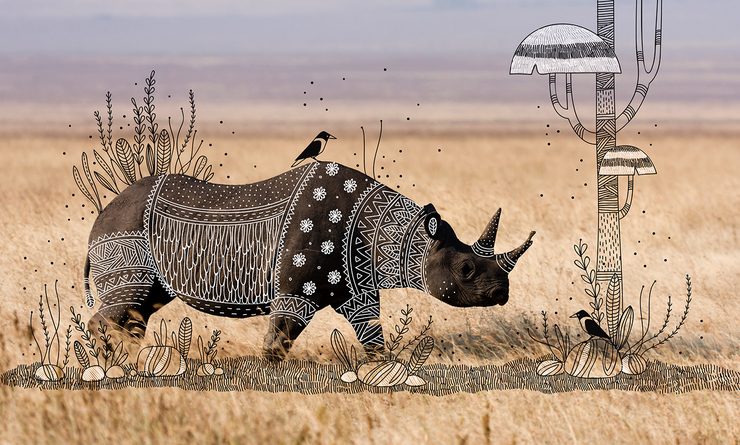 Illustrator doodles tribal costumes over animal photographs